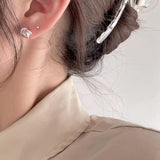 Boucles d'oreilles nœuds intemporelles